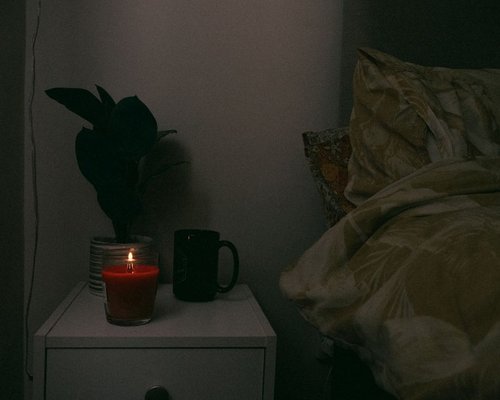 Peaceful dark bedroom ready for sleep
